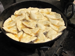 Frying Samosas